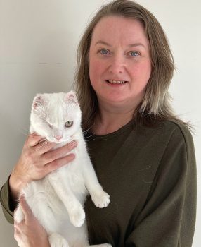 Kate Large and Smurf after the op to remove her ear flaps due to sun damage