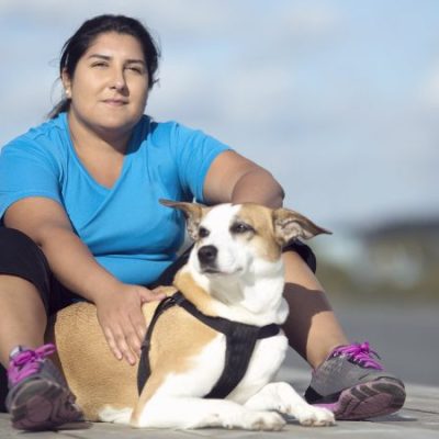 Overweight person with overweight dog