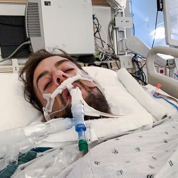 Ryan Fischer in hospital recovering from his gunshot wound to the chest