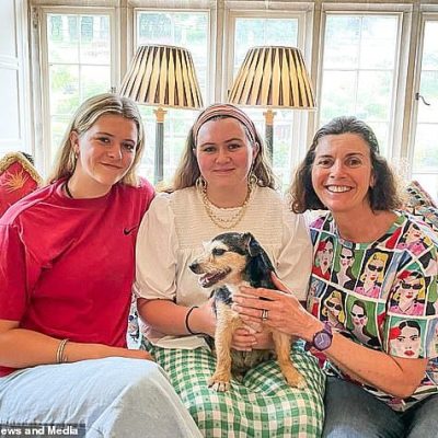 Elektra Covell, 18, and Tallulah Covell, 19, holding Crumpet with Sarah Covell