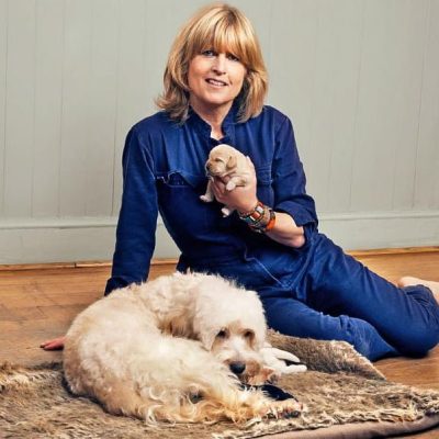 Rachel Johnson and her cockapoo Ziggy and one of her puppies