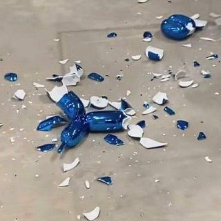 Jeff Koons balloon dog sculpture smashed at an art fair