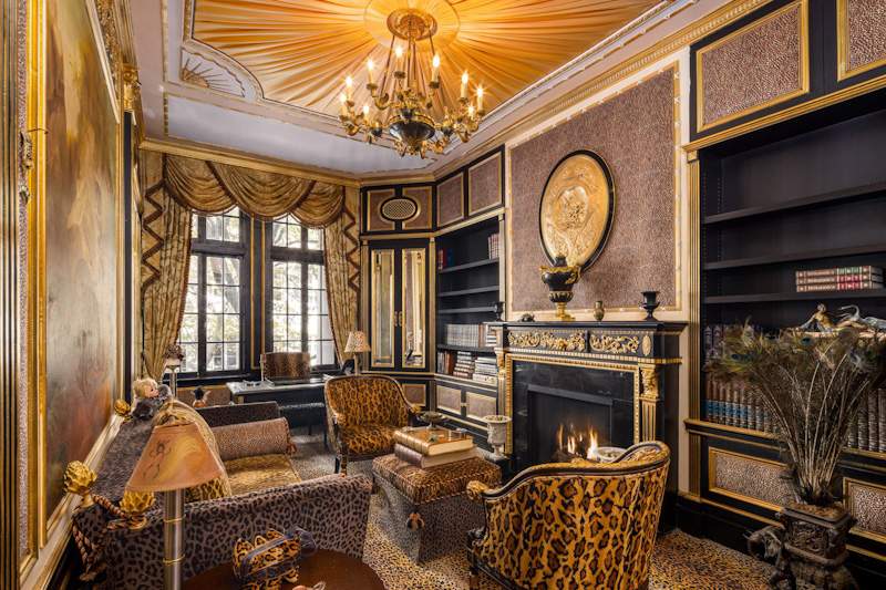 The sitting room showing leopard-print furnishings
