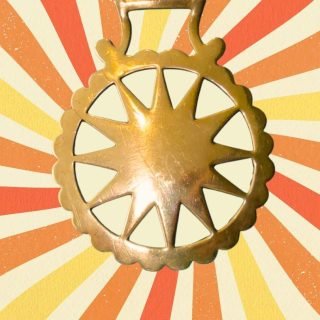 Horse-brass protecting the horse against evil forces by reflecting the sun's rays